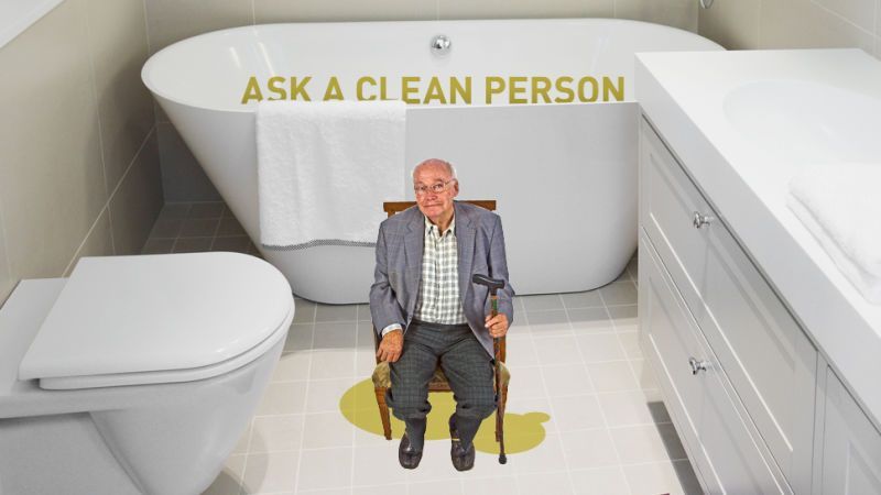 Old men peeing in the toilet