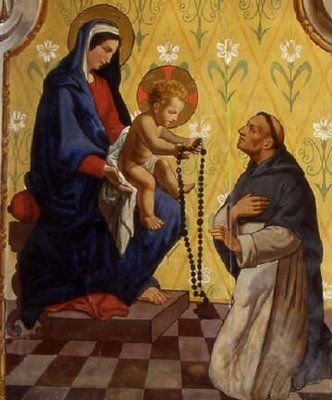 Virgin mary holding holy rosary